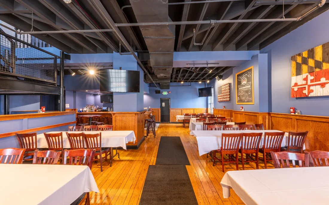 A room set with white linen for a private dinner