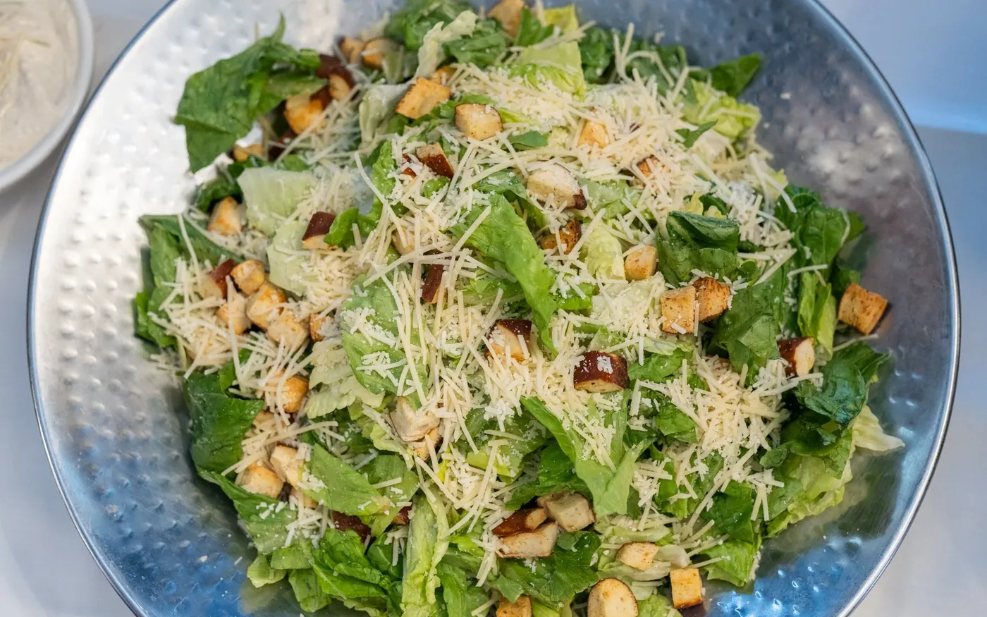 A large bowl of caesar salad