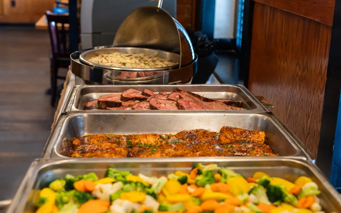 Chafing dishes on a carving and buffet line