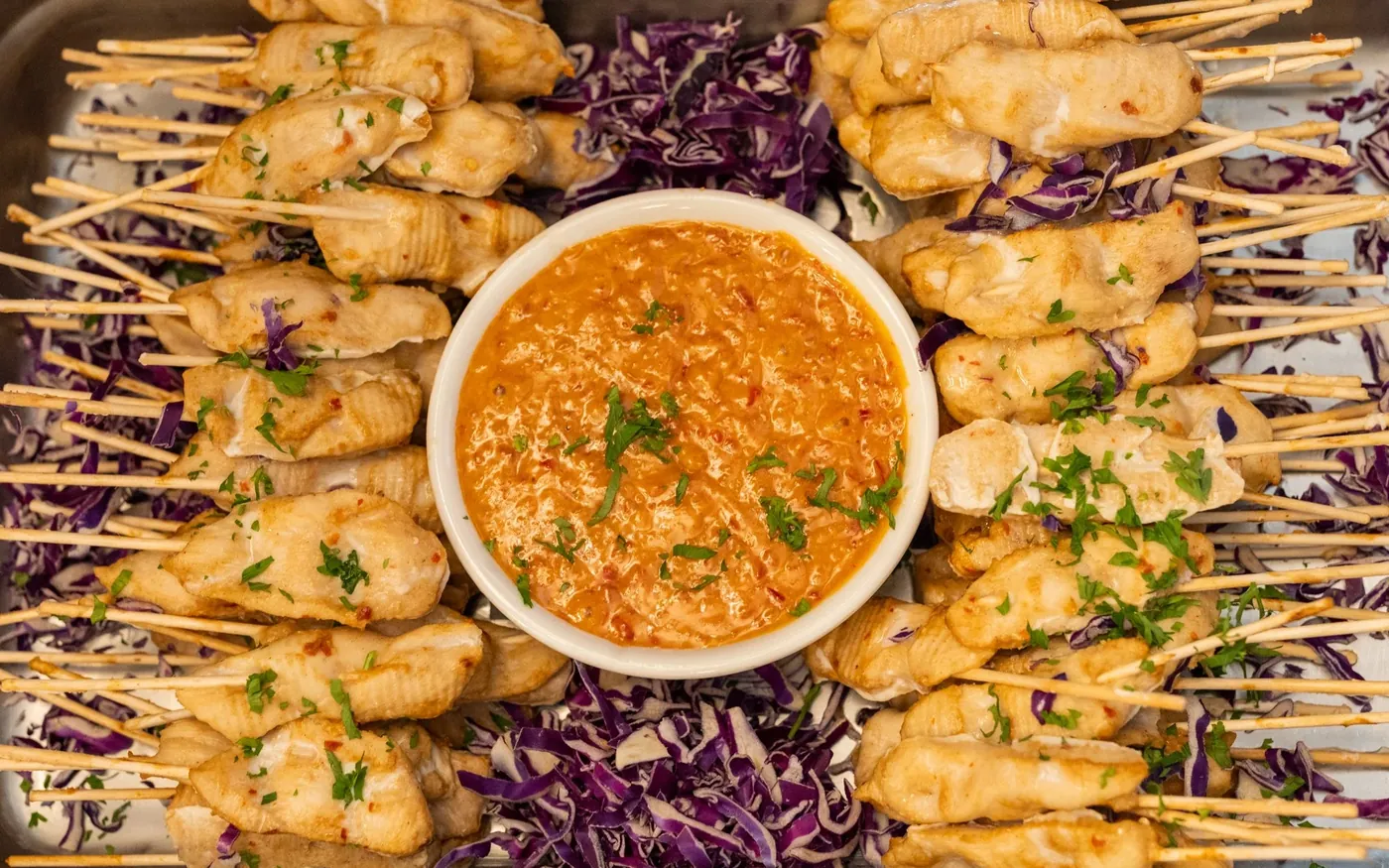 Chicken satay skewers with dipping sauce